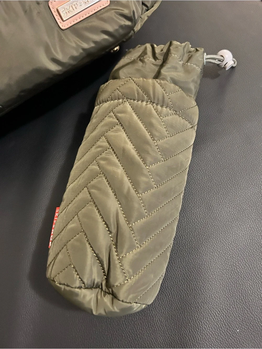 Skip Hop Olive Quilted Convertible Backpack with Tan Accents